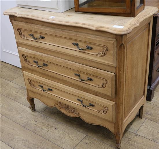 A light oak French chest of drawers W.92cm